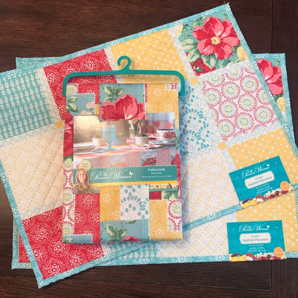 Pioneer Woman tablecloth and 2 placements